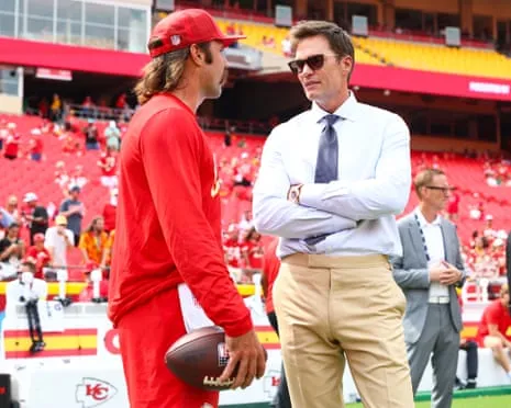 The seven-time Super Bowl champion ignites fan criticism following showing up in Las Vegas Raiders sideline box